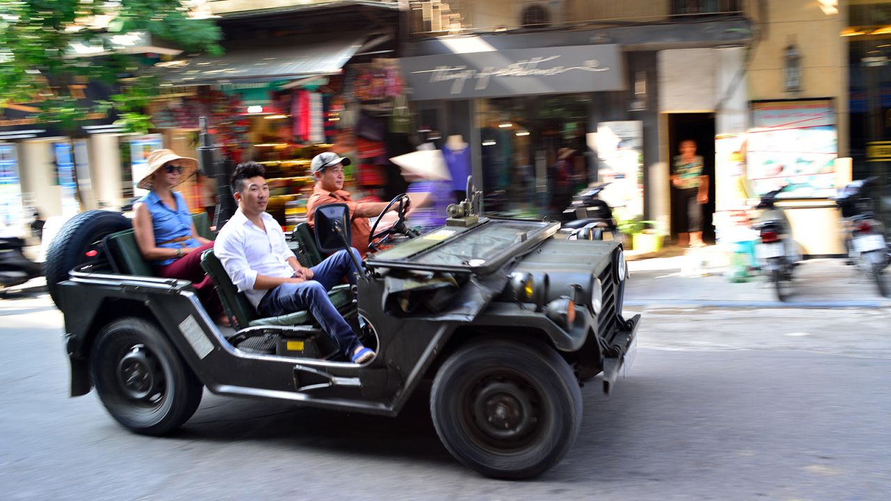 Guided jeep tours visit the tangled alleys and lakeside roads of Old Hanoi.