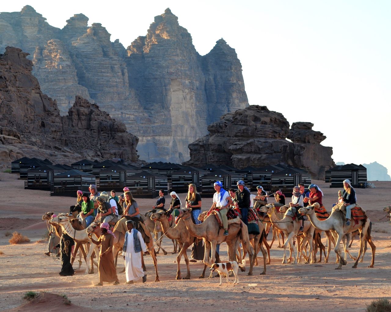 Local Bedouins take tourists on a camel ride through the Wadi Rum.