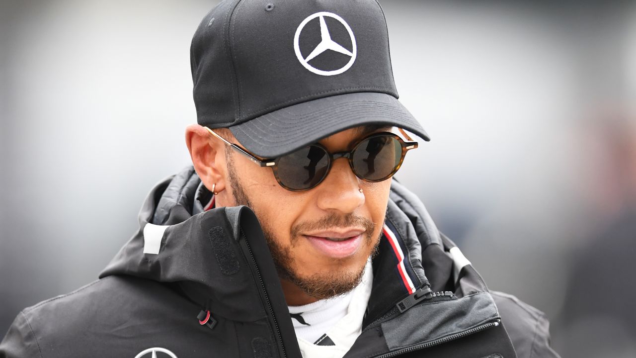 Mercedes' British driver Lewis Hamilton walks in the paddock after practice for the Formula One Chinese Grand Prix in Shanghai on April 13, 2018.  / AFP PHOTO / GREG BAKER        (Photo credit should read GREG BAKER/AFP/Getty Images)