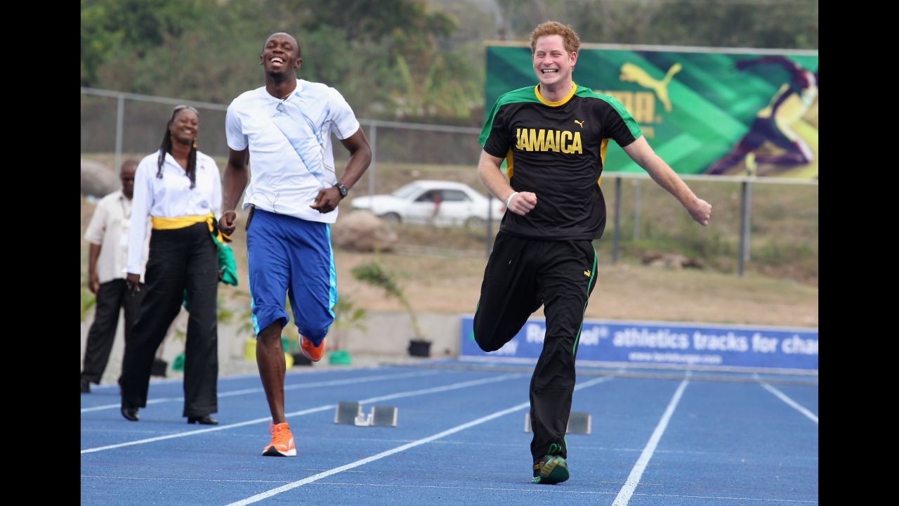 During a visit to Jamaica, Prince Harry challenged world-class sprinter Usain Bolt to a race. "I remember it so clearly," says Jackson. "Prince Harry sprinted off leaving Bolt trailing in his wake. That caught me by surprise... That's the kind of thing that happens with Harry. You've got to learn to always be ready." Kingston, Jamaica, March 2012.