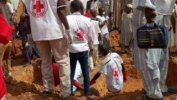 Nigerian Red Cross officials prepare a mass grave in Anka town in Zamfara, Nigeria.
