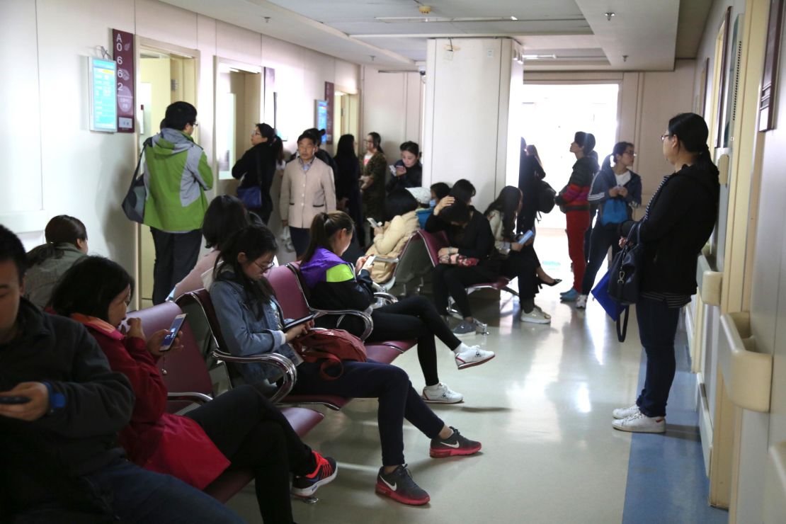 A crowd waits at a government-run reproductive health center. 