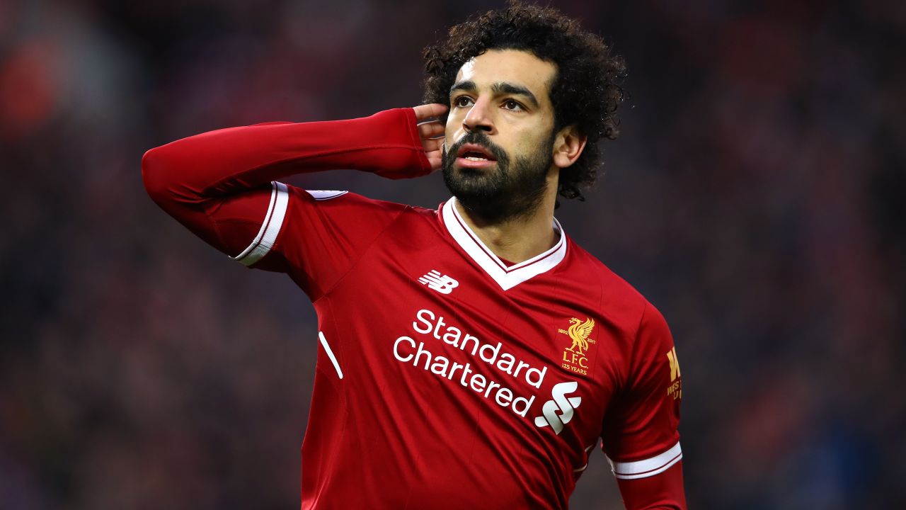 LIVERPOOL, ENGLAND - FEBRUARY 04:  Mohamed Salah of Liverpool celebrates after scoring his sides first goal during the Premier League match between Liverpool and Tottenham Hotspur at Anfield on February 4, 2018 in Liverpool, England.  (Photo by Clive Brunskill/Getty Images)