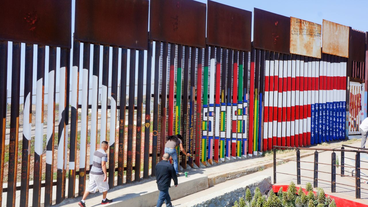 01 border fence flag mural