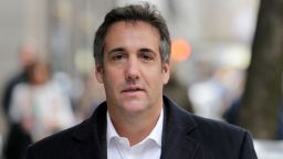 In this Wednesday, April 11, 2018, photo, Michael Cohen, President Donald Trump's personal attorney, walks along a sidewalk in New York. The company that publishes the National Enquirer paid a former doorman at one of Trump's New York skyscrapers $30,000 during the presidential campaign for a tip about Trump it never ran. Dino Sajudin signed a contract with American Media Inc. that barred him from discussing his tip with anyone. Cohen acknowledged to the AP that he had discussed Sajudin's story with the magazine when the tabloid was working on it. He said he was acting as a Trump spokesman when he did so and denied knowing anything beforehand about the Enquirer payment to the ex-doorman. (AP Photo/Seth Wenig)