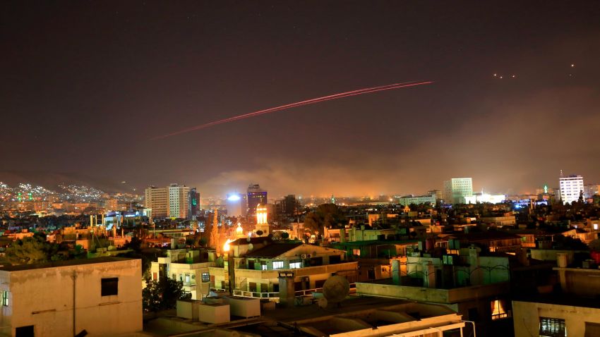 Damascus skies erupt with anti-aircraft fire as the U.S. launches an attack on Syria targeting different parts of the Syrian capital Damascus, Syria, early Saturday, April 14, 2018. Syria's capital has been rocked by loud explosions that lit up the sky with heavy smoke as U.S. President Donald Trump announced airstrikes in retaliation for the country's alleged use of chemical weapons. (AP Photo/Hassan Ammar)