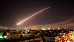 Damascus sky lights up with service to air missile fire as the U.S. launches an attack on Syria targeting different parts of the Syrian capital Damascus, Syria, early Saturday, April 14, 2018. Syria's capital has been rocked by loud explosions that lit up the sky with heavy smoke as U.S. President Donald Trump announced airstrikes in retaliation for the country's alleged use of chemical weapons. (AP Photo/Hassan Ammar)