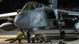 In this image released by Britain's Ministry of Defense, an RAF Tornado taxis into its hangar after landing at Britain Royal Air Force base in Akrotiri, Cyprus, after its mission to conduct strikes in support of operations over the Middle East Saturday, April 14, 2018. The United States, France and Britain launched military strikes in Syria to punish President Bashar Assad for an apparent chemical attack against civilians and to deter him from doing it again, President Donald Trump announced Friday. Pentagon officials said the attacks targeted the heart of Assad's programs to develop and produce chemical weapons. (Cpl L Matthews/MoD via AP)