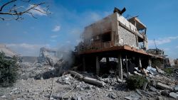 Damage is shown of the Syrian Scientific Research Center which was attacked by U.S., British and French military strikes to punish President Bashar Assad for suspected chemical attack against civilians, in Barzeh, near Damascus, Syria, Saturday, April 14, 2018. The Pentagon says none of the missiles filed by the U.S. and its allies was deflected by Syrian air defenses, rebutting claims by the Russian and Syrian governments. Lt. Gen. Kenneth McKenzie, the director of the Joint Staff at the Pentagon, also says there also is no indication that Russian air defense systems were employed early Saturday in Syria. (AP Photo/Hassan Ammar)