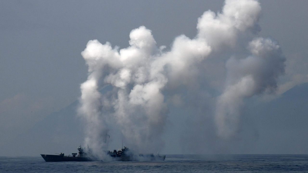 A frigate launches chaff and flare during a drill at the sea near eastern Taiwan on April 13.