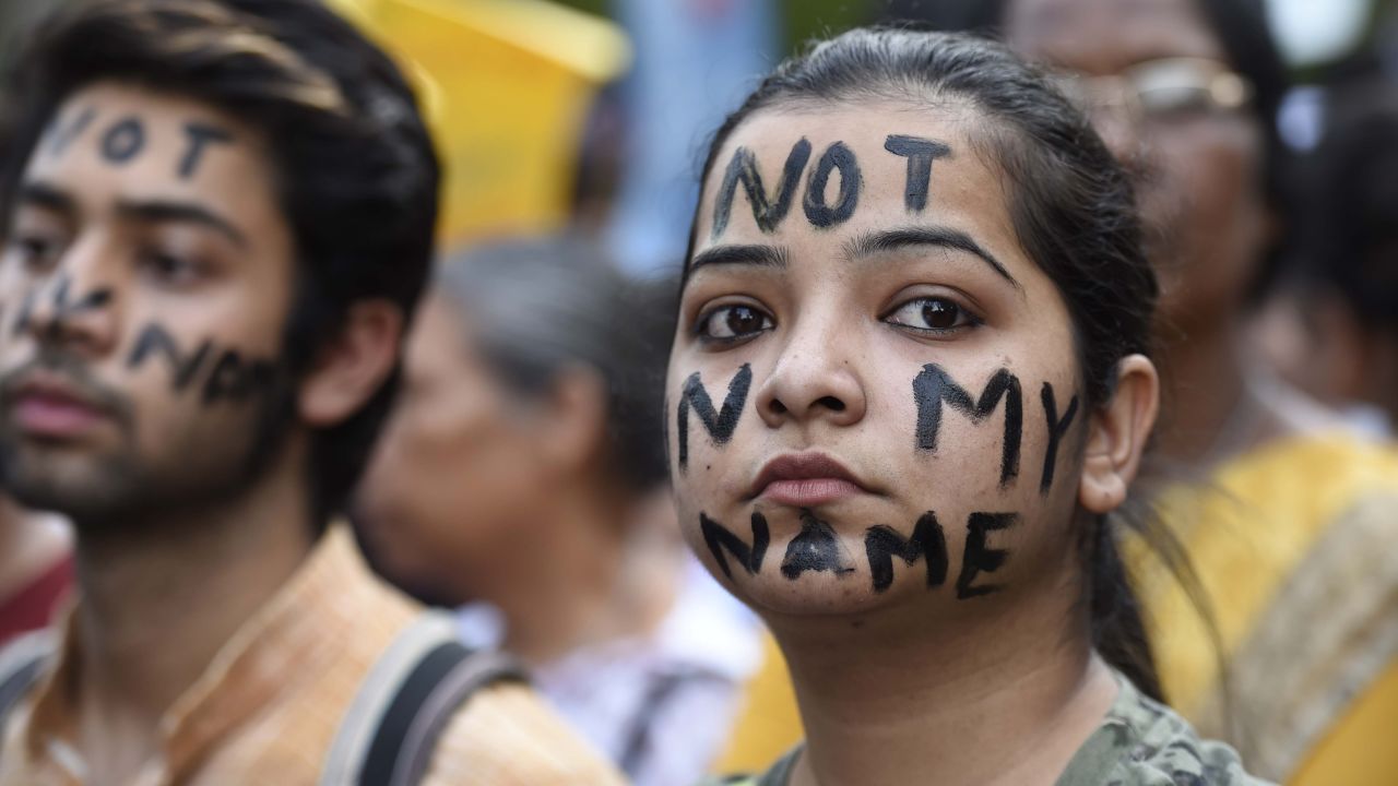 People take part in a Not In My Name protest at Parliament Street in New Dehli on April 15.