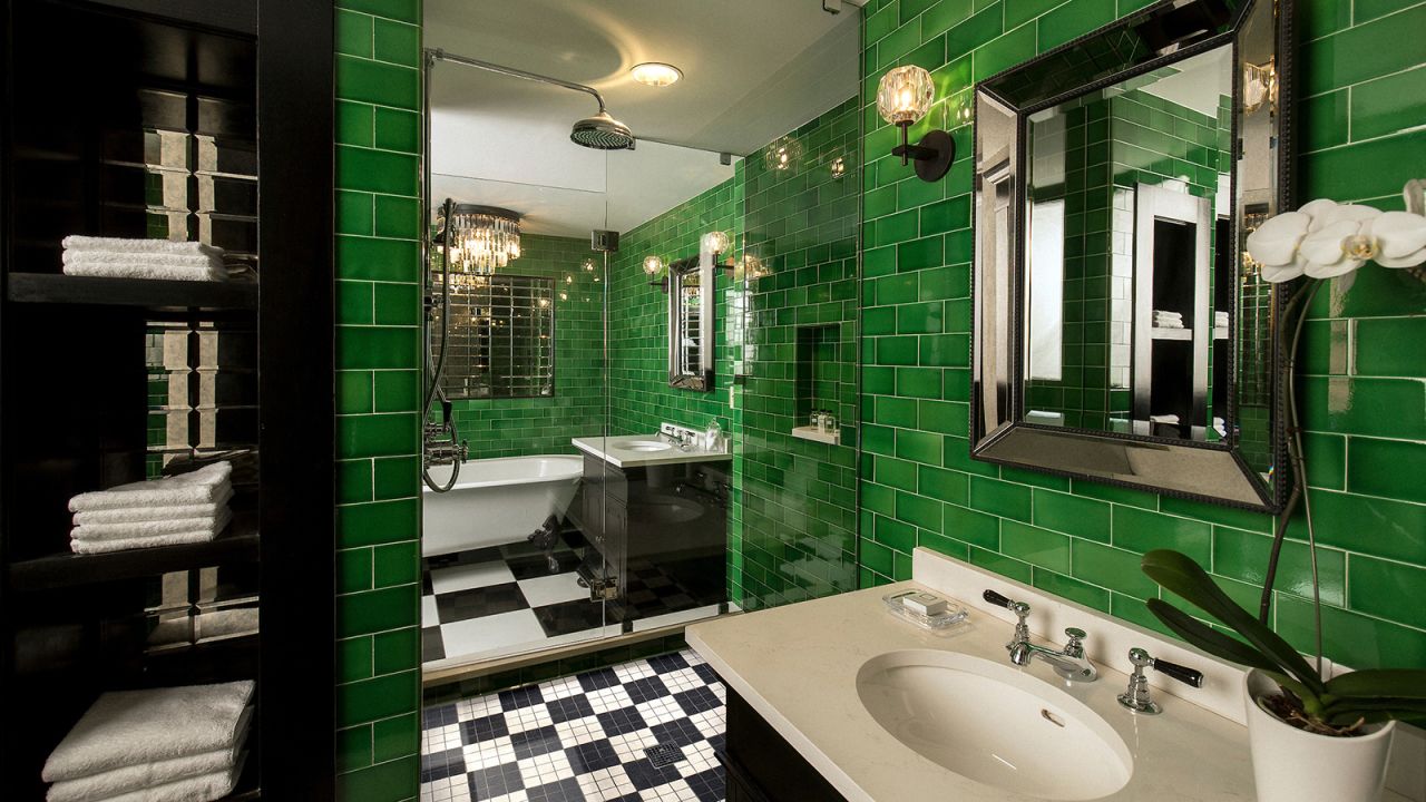 <strong>The Emerald Room: </strong>This subway tile-lined room gets its name from the bright green color used throughout.