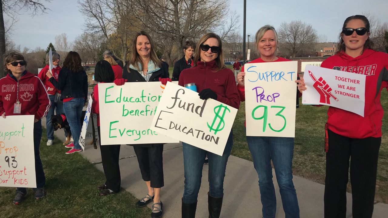 Laura Schachet participates in a walk-in at Webber Middle School in Fort Collins, Colorado.