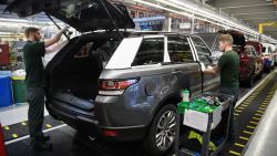 SOLIHULL, ENGLAND - MARCH 06:  Doors are fitted and checked during production at the Jaguar Land Rover factory on March 1, 2017 in Solihull, England. The company has pledged it's 'heart and soul' to production in the UK after producing the new "Velar" model for global sale, at their Solihull factory.  (Photo by Leon Neal/Getty Images)