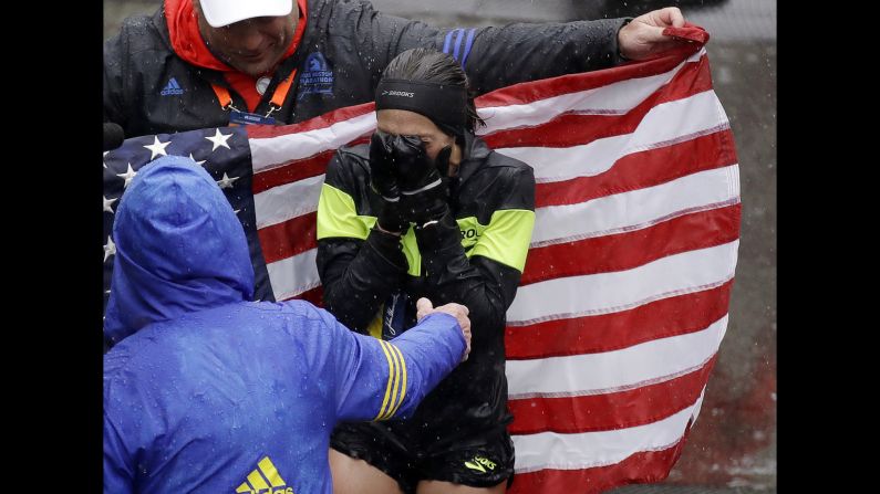 Desiree Linden of Michigan celebrates after winning the women's division of the 122nd Boston Marathon on Monday, April 16. She is the <a href="index.php?page=&url=https%3A%2F%2Fbleacherreport.com%2Farticles%2F2770814-boston-marathon-2018-results-desiree-linden-1st-american-woman-to-win-since-85" target="_blank" target="_blank">first American woman to win the race since 1985</a>. 