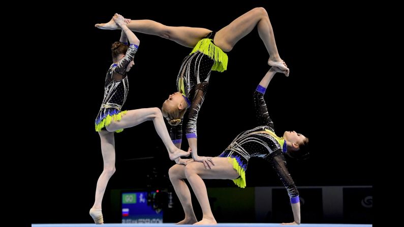 Russian gymnasts Daria Chebulanka, Polina Plastinina and Kseniia Zagoskina compete in the final of the women's group competition on the second day of the Acrobatic Gymnastics World Championships in Antwerp, Belgium, on Saturday, April 14.