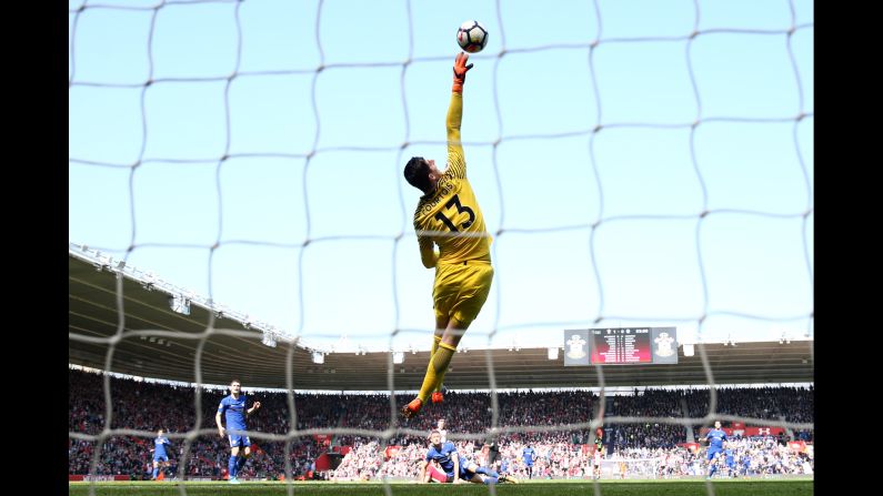 Thibaut Courtois of Chelsea jumps to makes a save during the Premier League match against Southampton on Saturday, April 14, in Southampton, England.