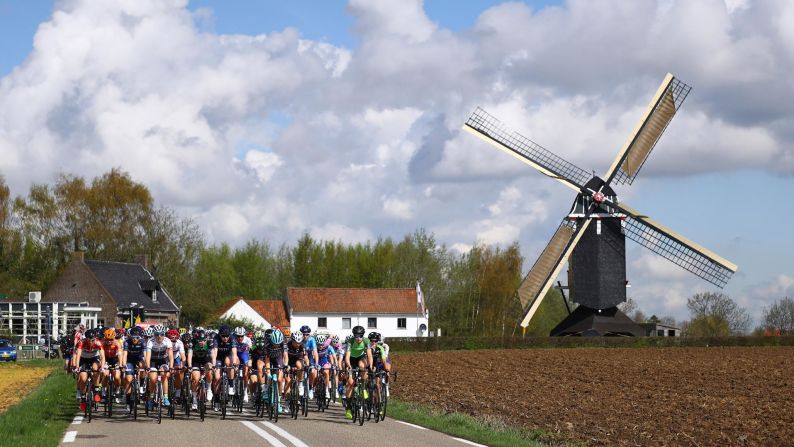 The peloton passes by a windmill during the fifth Amstel Gold Race on Sunday, April 15, in Berg En Terblijt, Netherlands. <a href="index.php?page=&url=https%3A%2F%2Fwww.cnn.com%2F2018%2F04%2F09%2Fsport%2Fgallery%2Fwhat-a-shot-sports-0410%2Findex.html" target="_blank">See 25 amazing sports photos from last week</a>