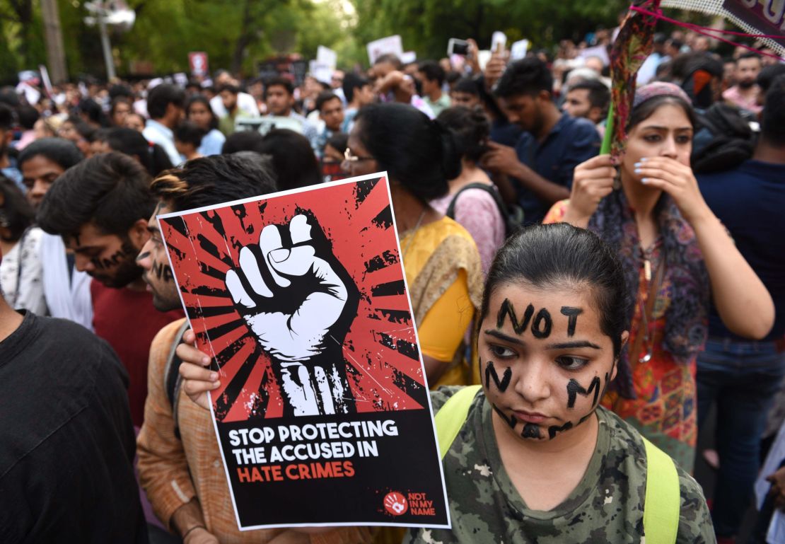 Protesters take part in the 'Not In My Name' protest against the Kathua and Unnao rape cases, in New Dehli on April 15.