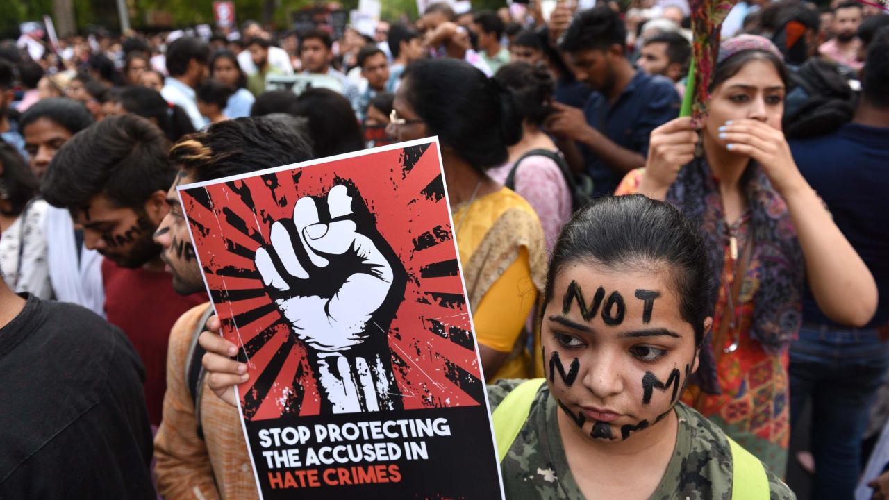 Protesters take part in the 'Not In My Name' protest against the Kathua and Unnao rape cases, in New Dehli on April 15.