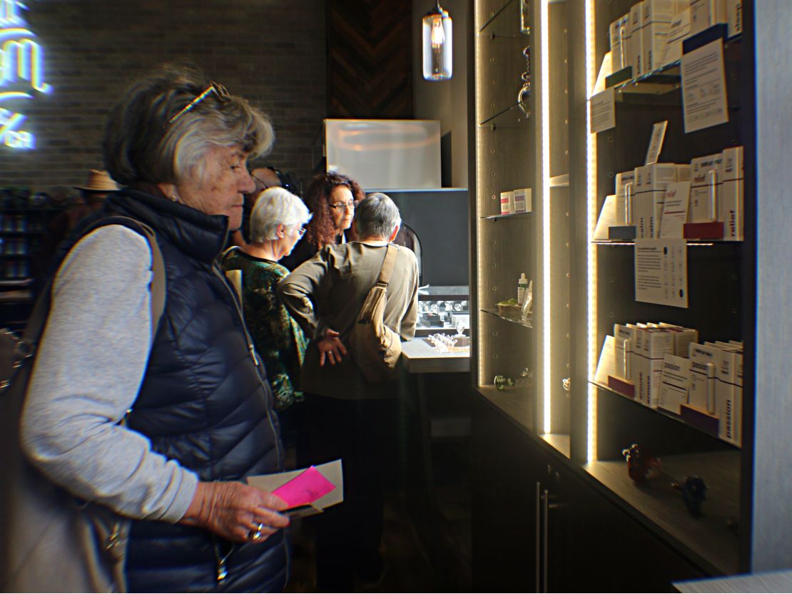 Christy Diller browses at the medical marijuana shop.