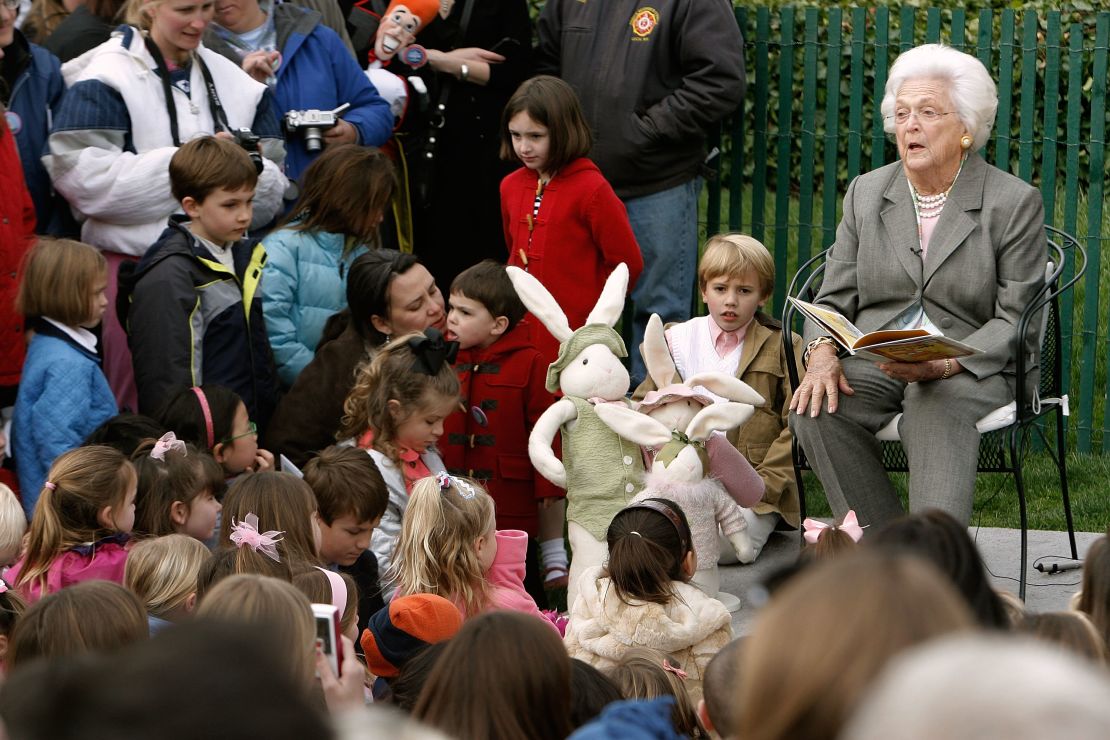 Former first lady and mother of President George W. Bush, Barbara Bush reads during the annual Easter Egg Roll at the White House on March 24, 2008 in Washington, DC. 