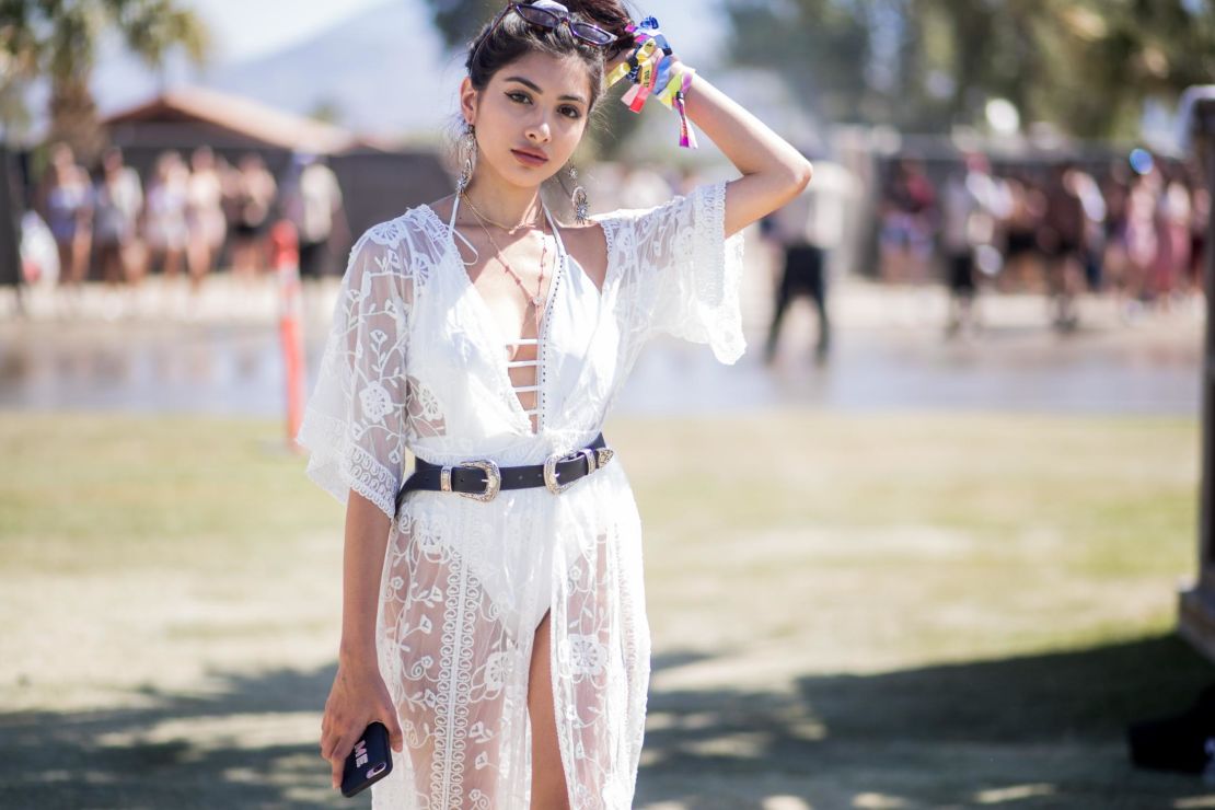 A guest wearing white sheer kimono is seen on April 14, 2018 in Indio, California. (Photo by Christian Vierig/GC Images)