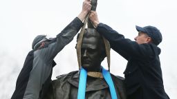 NEW YORK, NY - APRIL 17:  Parks Department workers place a harness over a statue of J. Marion Sims, a surgeon celebrated by many as the father of modern gynecology, before it is taken down from its pedestal at Central Park and East 103rd Street  on April 17, 2018 in New York City. A New York City panel decided to move the controversial statue after groups demanded its removal as many of Sims medical breakthroughs came from experimenting on black slaves without anesthesia. The statue will be relocated in Green-Wood Cemetery in Windsor Terrace, where Sims is buried.  (Photo by Spencer Platt/Getty Images)