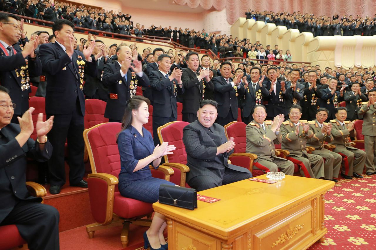 This photo from North Korean state media shows Kim and Ri attending an art performance in September 2017 dedicated to nuclear scientists and technicians, who worked on a hydrogen bomb which the regime claimed to have successfully tested, at the People's Theater in Pyongyang.