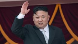 North Korean leader Kim Jong-Un waves from a balcony of the Grand People's Study house following a military parade in Pyongyang on April 15, 2017. 