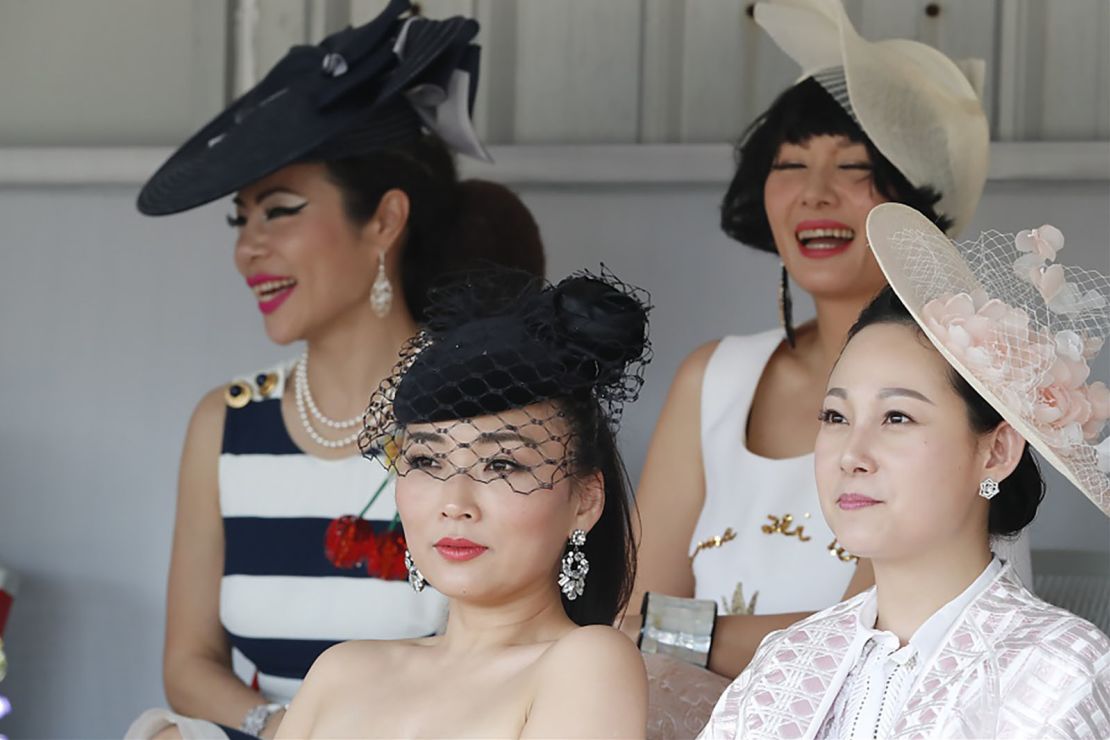 Spectators dress to impress in Shanghai.