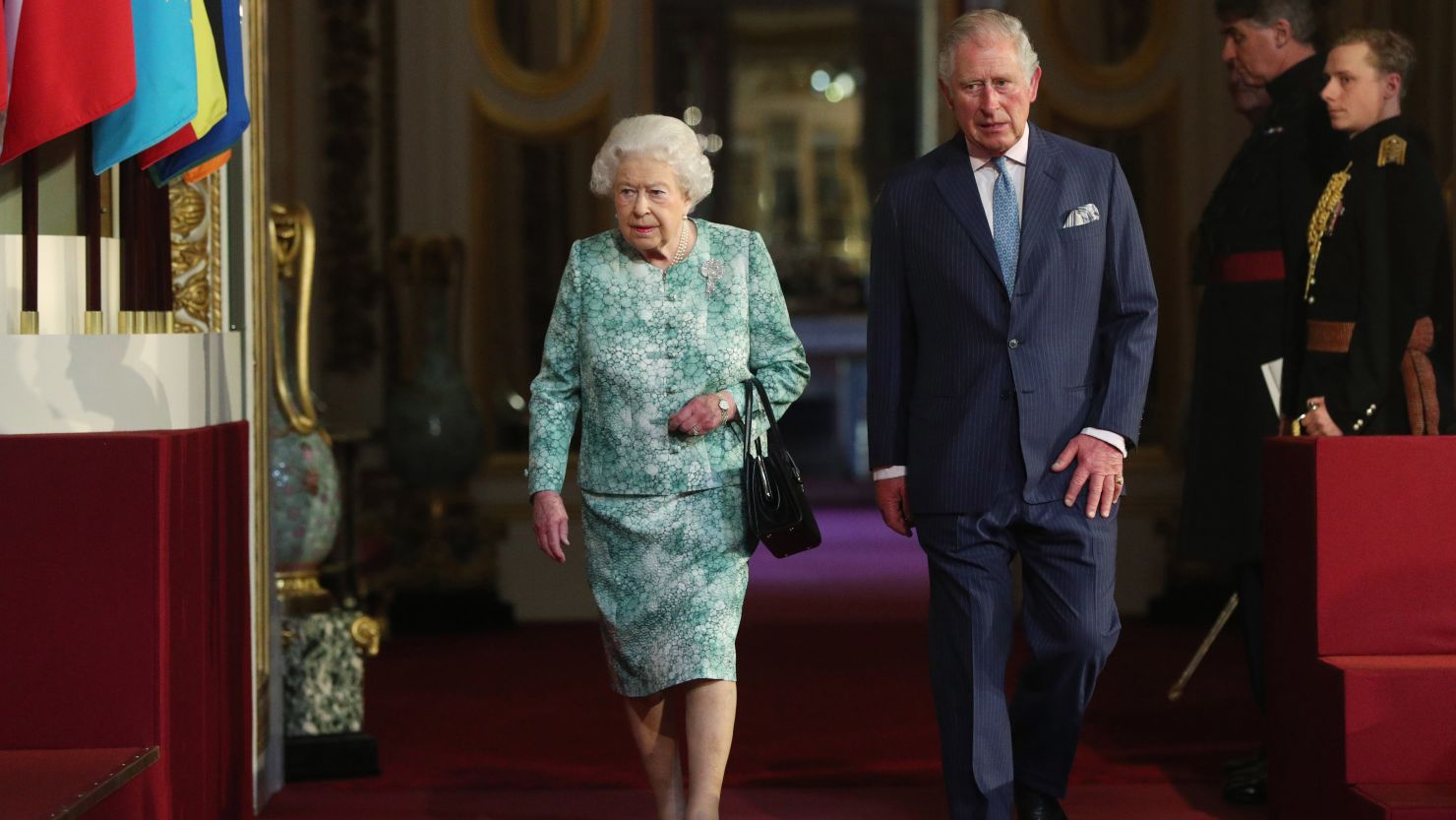 Queen Elizabeth II and Prince Charles attend the formal opening Thursday of the Commonwealth Heads of Government Meeting at Buckingham Palace.