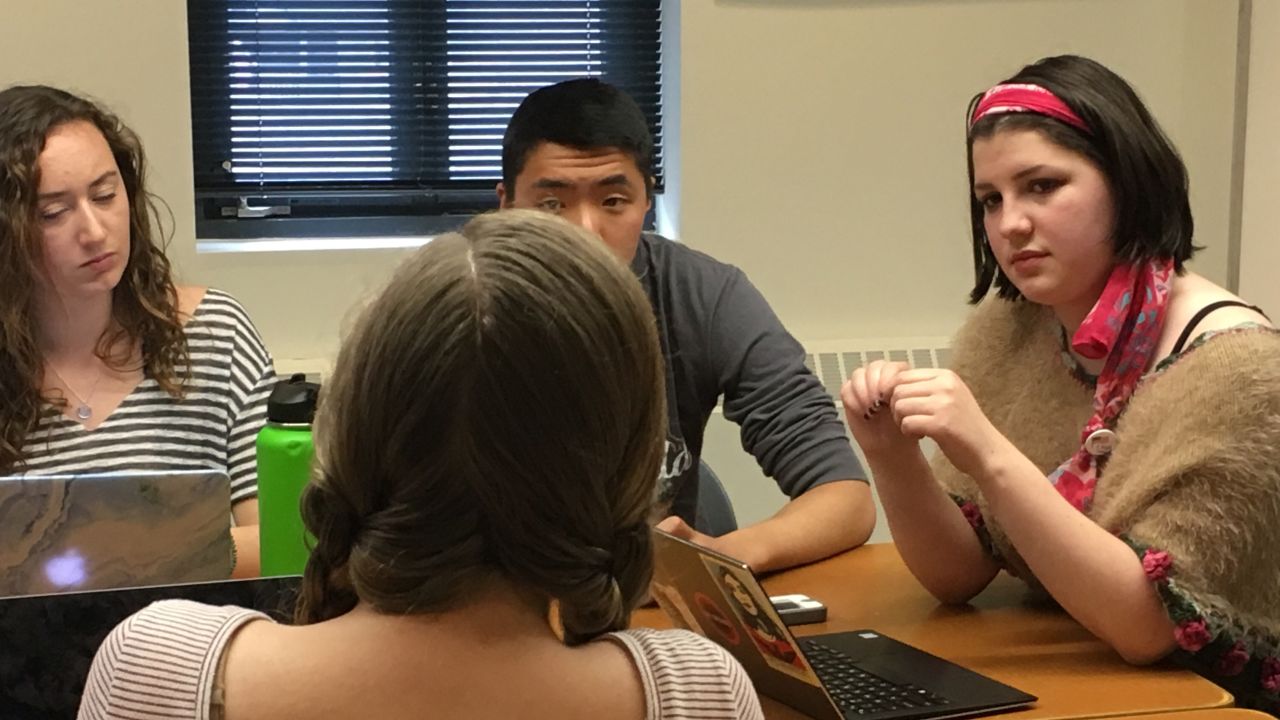 Lane Murdock, 16, discusses logistics with classmates a week ahead of Friday's National School Walkout.