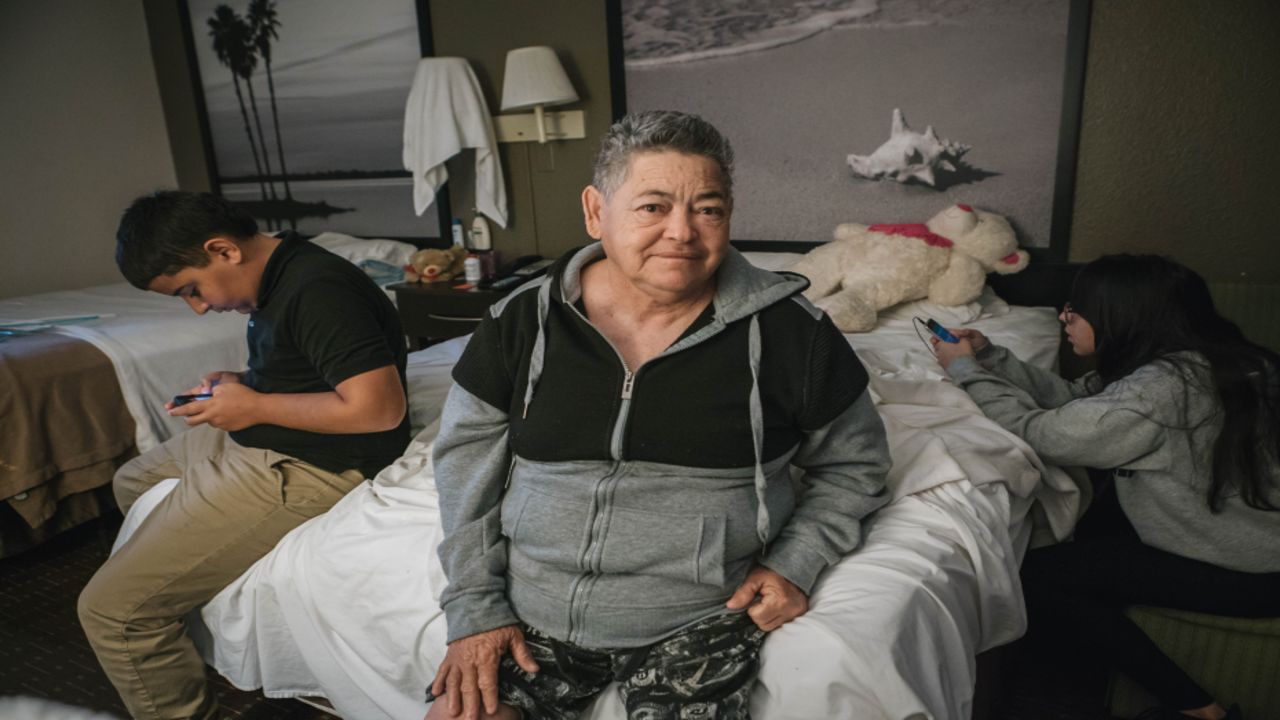 Sonia Burgos and her grandchildren, ages 14 and 12, live at the Super 8 motel in Kissimmee, Florida.