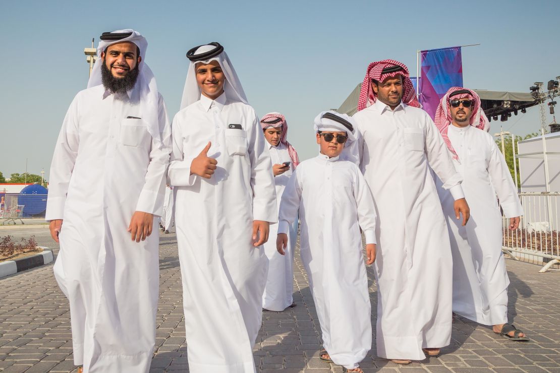 Fans attend a match at the Khalifa International Stadium.