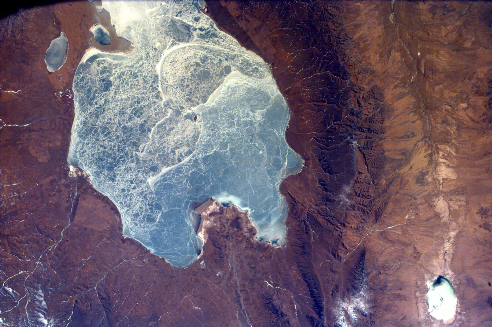 <strong>Lake Qinghai, China: </strong>NASA's EarthKAM captured this surreal image of Lake Qinghai -- the largest in China. Located on the Tibetan Plateau, the lake stretches across 1,667 square miles and reaches a depth of 84 feet.