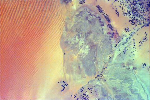 <strong>Empty Quarter, Saudi Arabia:</strong> NASA's EarthKAM caught a beautiful intersection between the outskirts of As Sulayyil Sulayel city and the Rub' al Khali desert in Saudi Arabia. Also known as the Empty Quarter, this is the world's largest contiguous sand desert. 