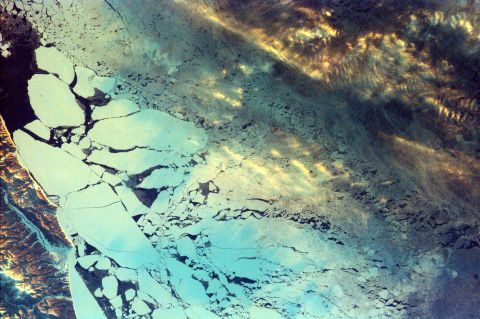 <strong>Sakhalin Island, Russia:</strong> Off the coast of Russia, north of Japan, Sakhalin Island looks like an abstract painting in this photo captured by EarthKAM.