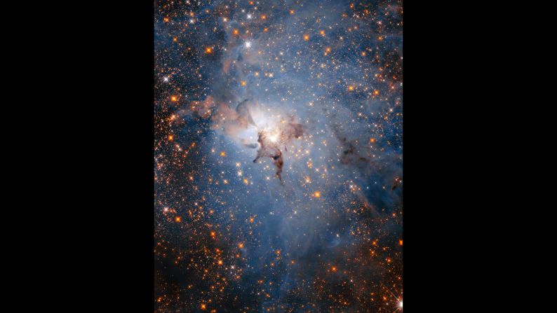 This is a more star-filled view of the Lagoon Nebula, using Hubble's infrared capabilities. The reason you can see more stars is because infrared is able to cut through the dust and gas clouds to reveal the abundance of both young stars within the nebula, as well as more distant stars in the background. 