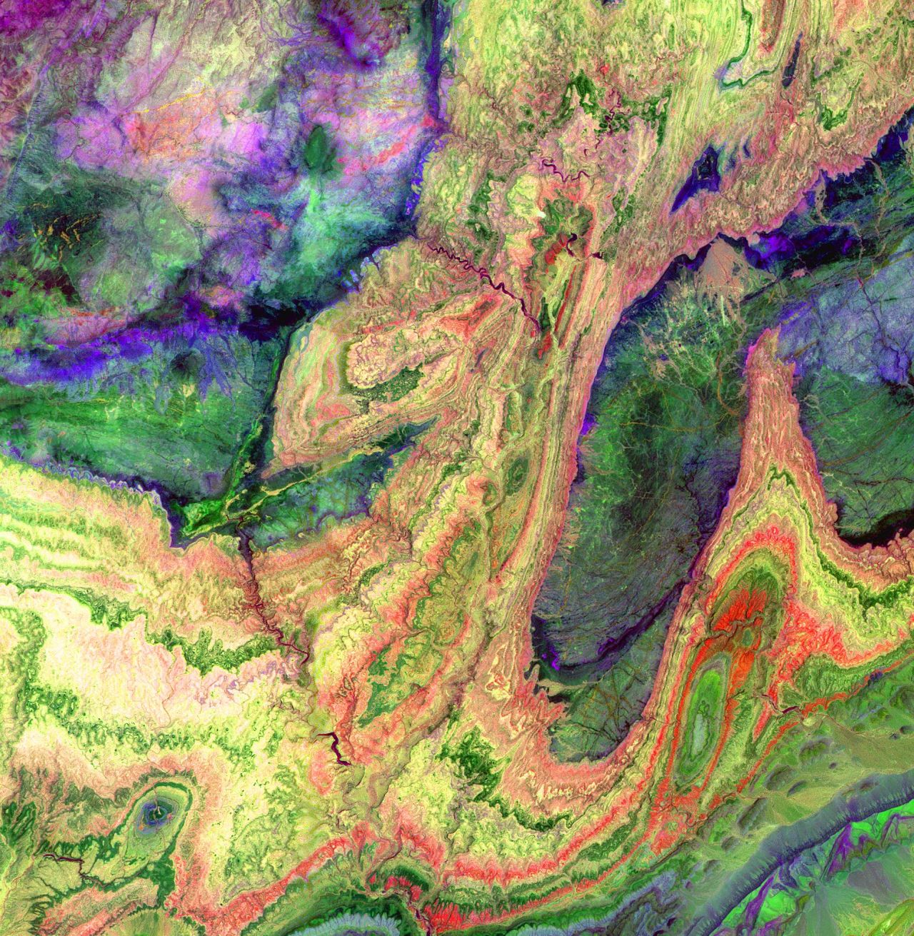 <strong>The Anti-Atlas Mountains, Morocco: </strong>The swirling hues of the Anti-Atlas Mountains were captured by ASTER (Advanced Spaceborne Thermal Emission and Reflection Radiometer) on NASA's Terra satellite. Formed roughly 80 million years ago, the mountains formed when Africa and Eurasia collided, resulting in a diverse composition of limestone, sandstone, gypsum and granitic rocks.   
