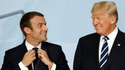 French President Emmanuel Macron (L) stands next to US President Donald Trump as they pose for a family photo with participants of the G20 summit in Hamburg, northern Germany, on July 7, 2017.Leaders of the world's top economies gather from July 7 to 8, 2017 in Germany for likely the stormiest G20 summit in years, with disagreements ranging from wars to climate change and global trade. / AFP PHOTO / Odd ANDERSEN        (Photo credit should read ODD ANDERSEN/AFP/Getty Images)