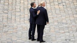 PARIS,  FRANCE - JULY 13:  French President Emmanuel Macron welcomes US President Donald Trump at Les Invalides As part of the commemoration of the 100th anniversary of the entry of the United States of America into World War I on July 13,  2017 in Paris,  France. US President,  Donald Trump will attend a military parade during Bastille Day.  (Photo by Pierre Suu/Getty Images)