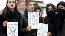 Law students hold placards during a protest calling for justice following the rape and murder of an eight-year-old girl in the Indian state of Jammu and Kashmir, in Srinagar on April 18, 2018.
