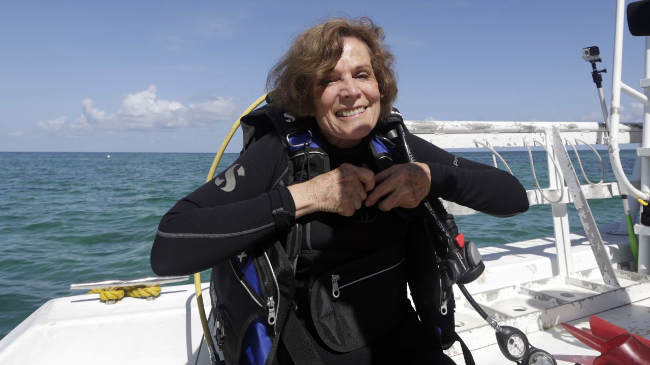 In this Monday, Aug, 11, 2014 photo, marine biologist Sylvia Alice Earle prepares to survey the corals off the coast of Islamorada, Fla. U.S. government scientists hope people will soon be able to go online and get a 360-degree view of reefs and other underwater wonders, much like Google Maps street view lets people look at homes. (AP Photo/Alan Diaz)