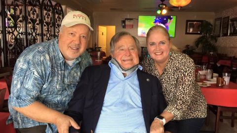 The Hajjars with President George H.W. Bush during a visit in October 2015