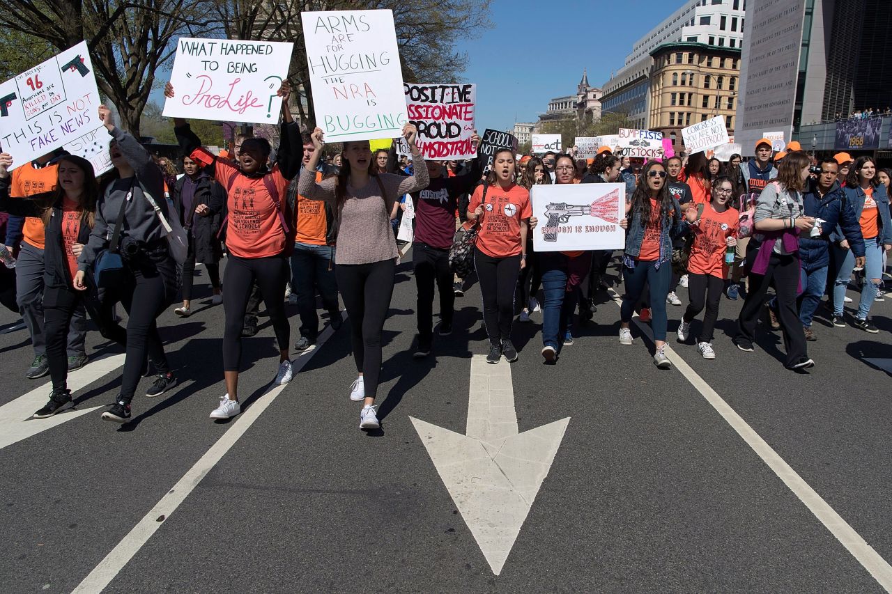 Several hundred high school students march from the White House to the US Capitol to rally against the National Rifle Association (NRA) and call for stricter gun laws in Washington.