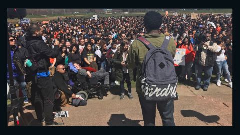Brendan Smith, a sophomore at Kenwood Academy, addresses a crowd Friday at Chicago's Grant Park.