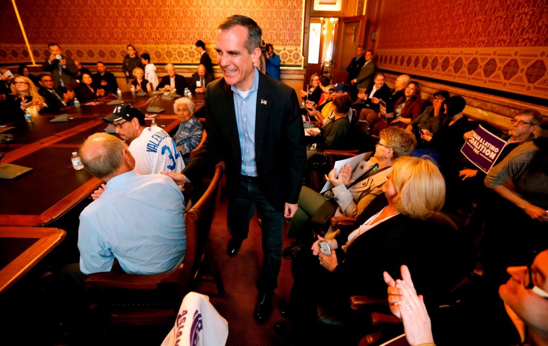 Los Angeles Mayor Eric Garcetti arrives at a meeting with the Asian and Latino Coalition, Friday, April 13, 2018, at the Statehouse in Des Moines, Iowa. 