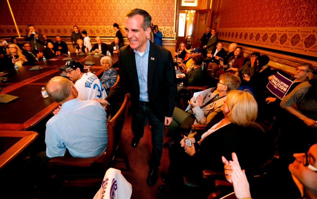Los Angeles Mayor Eric Garcetti arrives at a meeting with the Asian and Latino Coalition, Friday, April 13, 2018, at the Statehouse in Des Moines, Iowa.