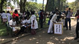 Nurses attending to the public at the Africa Unity Square in Harare,  Zimbabwe's capital Friday.
